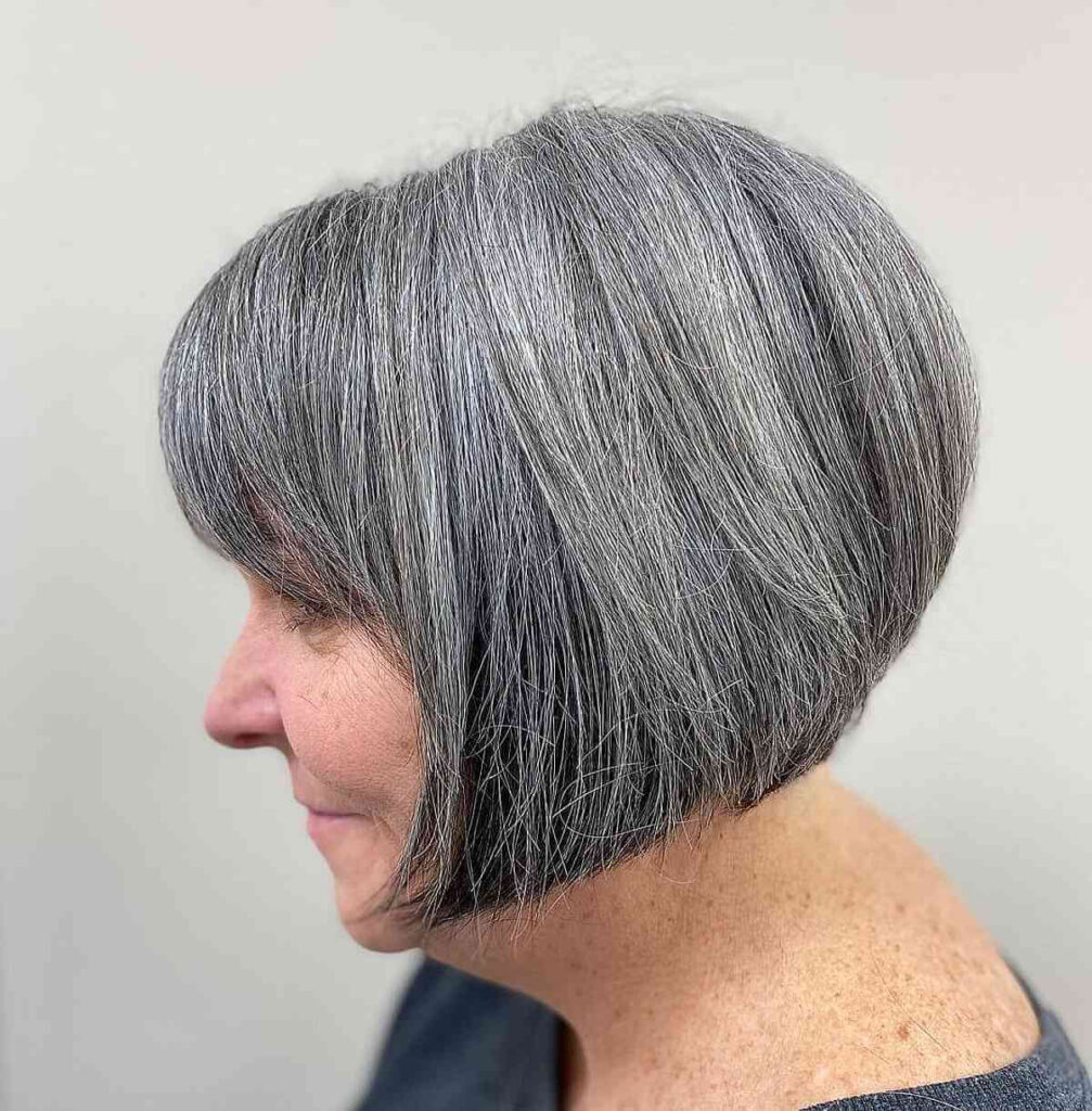 chin length inverted bob with a fringe for women over sixty