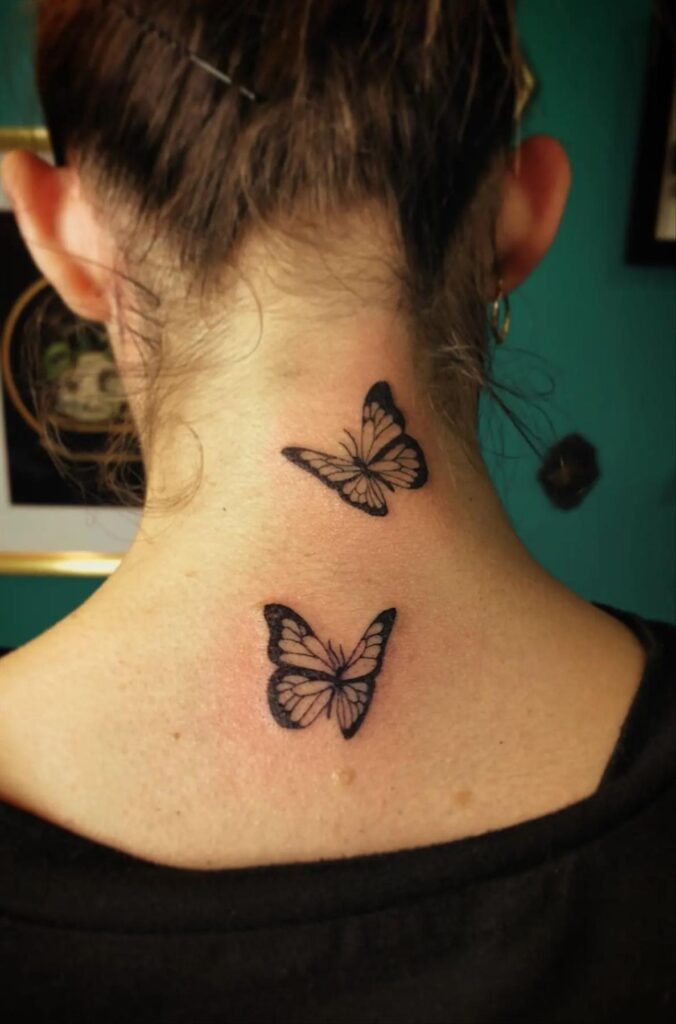 Butterfly tattoos on ear and neck 4