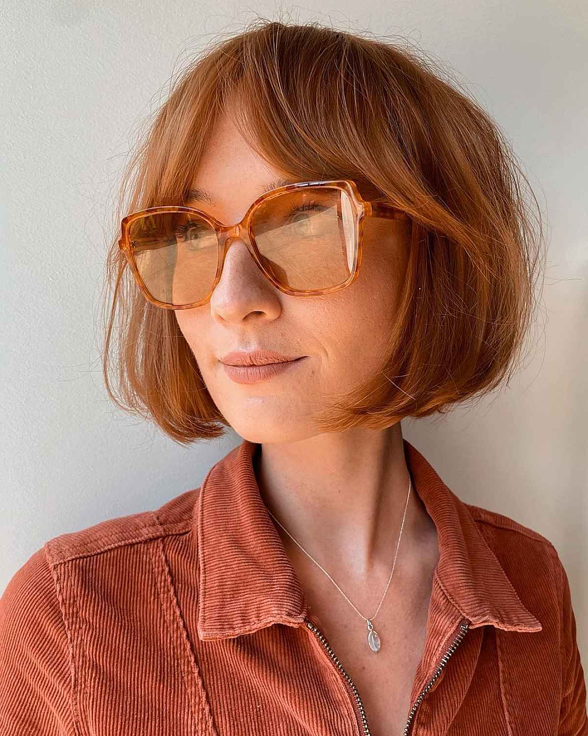 chin length bob with curtain bangs