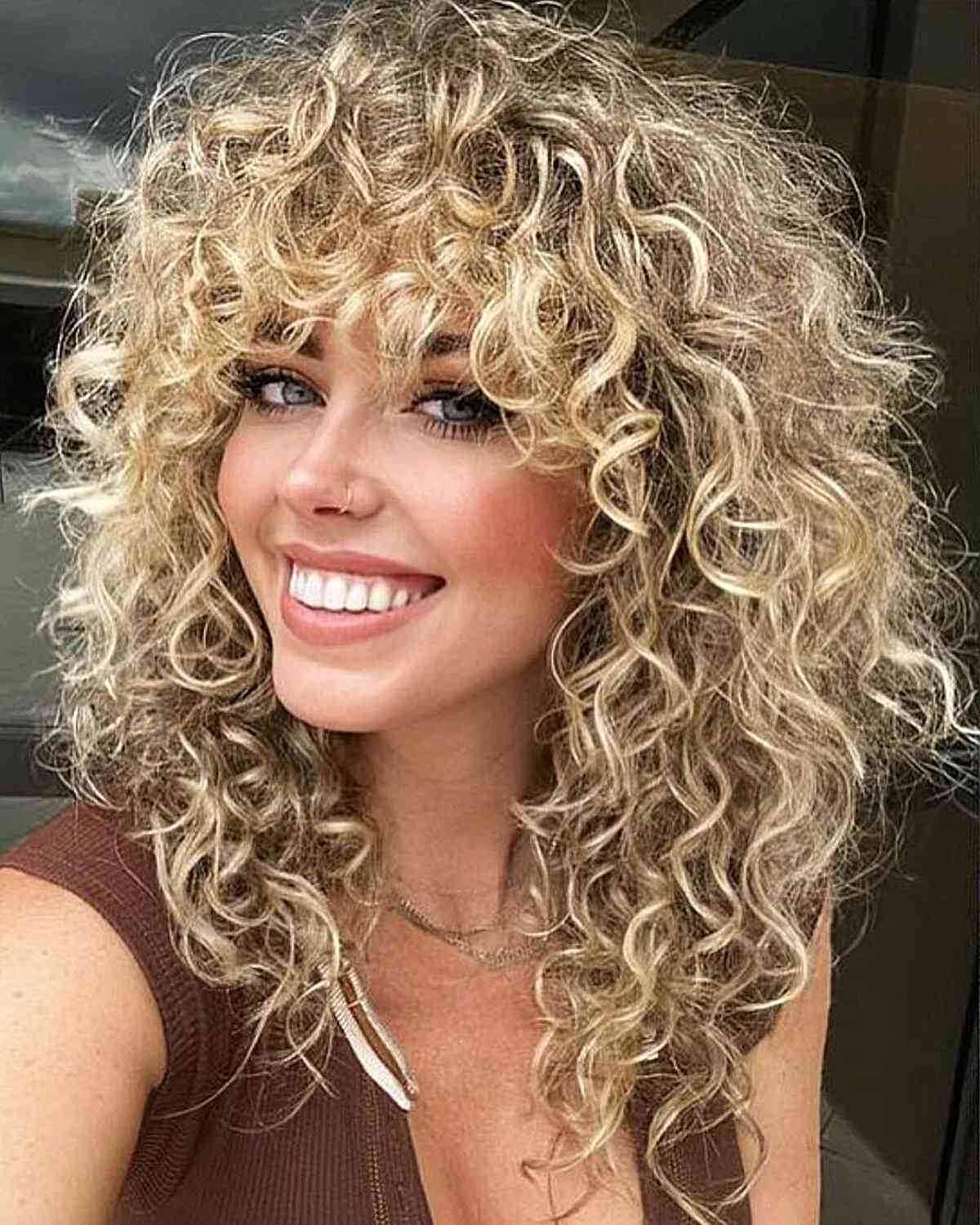 80s textured curly shag with bangs