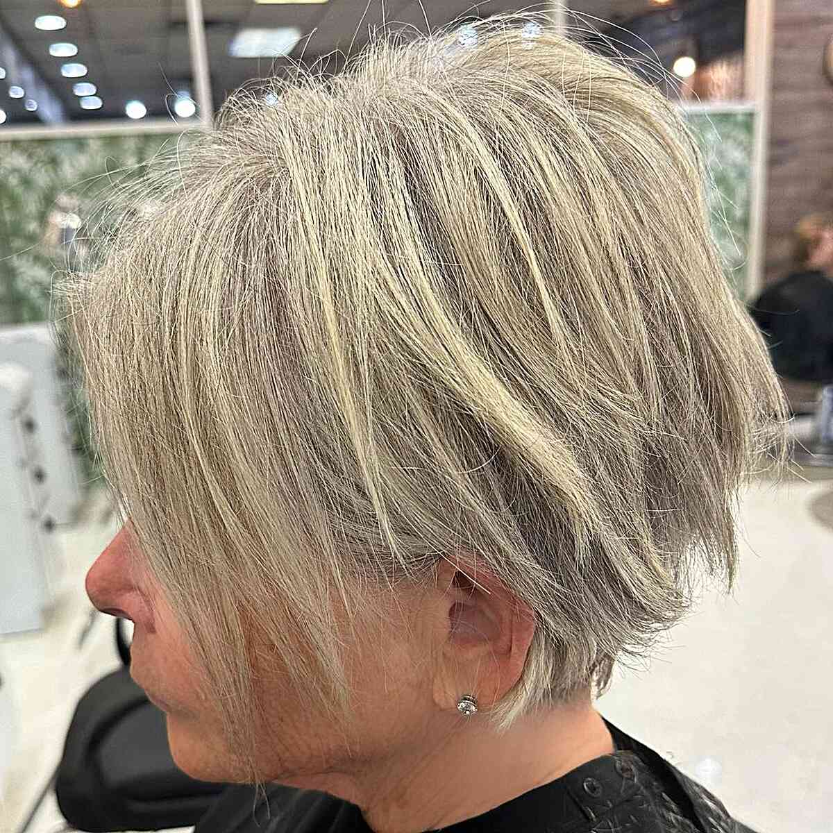 long messy pixie bob with graduation on older women