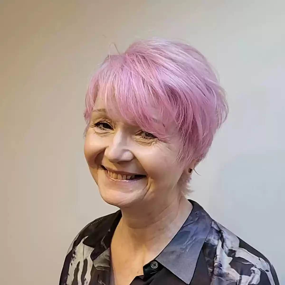 pastel pink on wispy pixie bob hair for older ladies