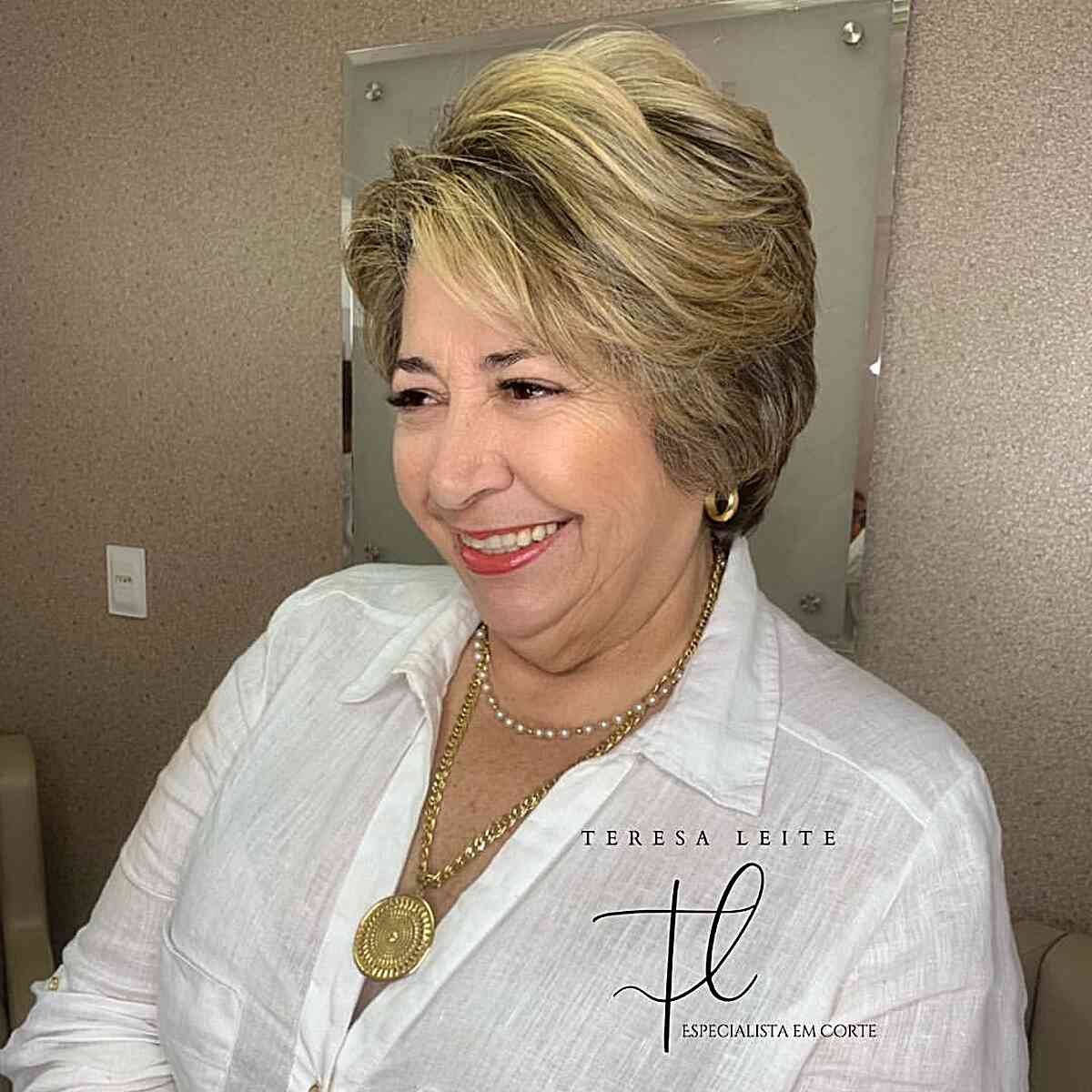 short feathered pixie cut with swoopy layers for older ladies