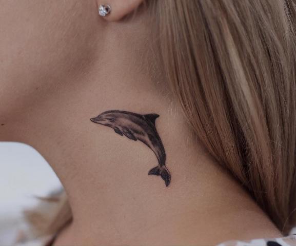 Dolphin neck tattoo design